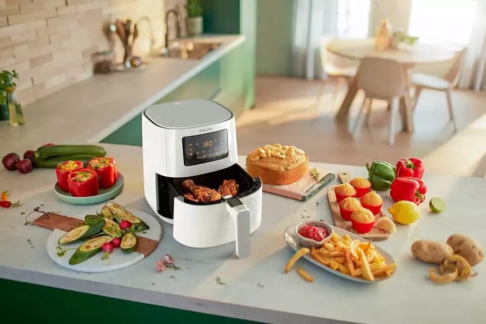 Philips Airfryer Essential Compact Digital HD9252/00 - Ölfreie Fritteuse, 0,8 kg - Rapid Air Technologie - 7 Voreinstellungen - Weiß Compra ahora la Philips Airfryer Essential Compact Digital HD9252/00, la fritteuse sin aceite perfecta para tu hogar. Con capacidad de 0,8 kg y tecnología Rapid Air, esta fritteuse ofrece 7 voreinstellungen para una cocción rápida y saludable. ¡No te quedes sin la tuya!