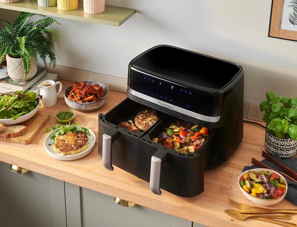 Russell Hobbs 27681-56 SatisFry Heißluftfritteuse, 2 Kammern, 9 L, Rapid AirFryer [2 Fächer à 4,5 Liter, sehr leiser Betrieb, 9 Programme] SatisFry Fritteuse (spülmaschinenfest, Match & Sync-Funktion) - Imagen del producto con diseño elegante y funcionalidad avanzada.